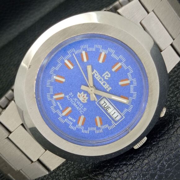Vintage 1974 Ricoh Automatic Mens Silver Watch W/daydate & Blue accents - Picture 1 of 8